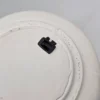 Ceramiczny talerz dekoracyjny z dzieckiem w kołysce – ręcznie malowany, Ø 17 cm