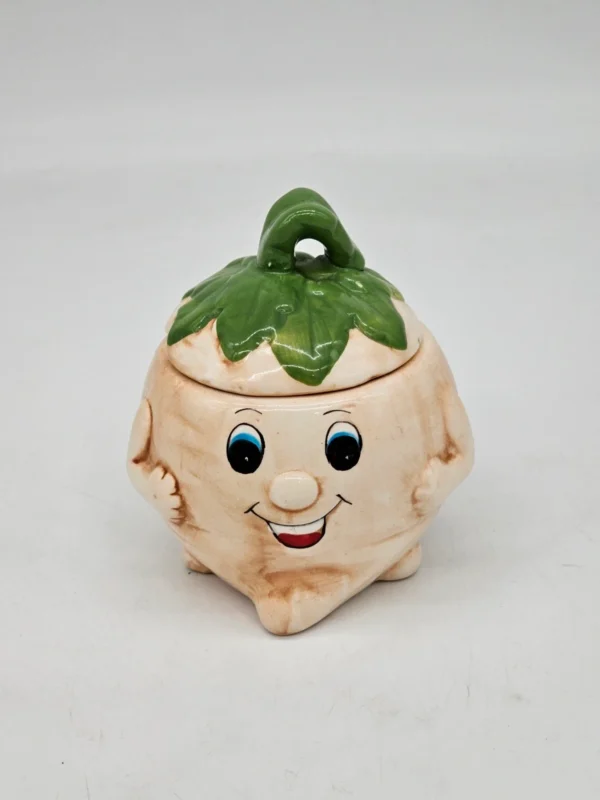 Ceramiczny pojemnik ręcznie robiony – uroczy warzywniak z uśmiechem, 12 cm