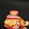 Skarbonka ceramiczna – grający klaun z psem, na beczce – wys. 17 cm