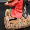 Skarbonka ceramiczna – grający klaun z psem, na beczce – wys. 17 cm