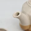 Zestaw ceramiczny: dzbanek i 6 kubków w odcieniach beżu i karmelu