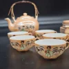 Komplet japońskiej porcelany – 21-elementowy zestaw herbaciano-kawowy z motywem gejszy, 6-osobowy