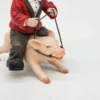 Gilde Clowns – Klaun jadący na śwince, wysokość 14 cm