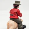 Gilde Clowns – Klaun jadący na śwince, wysokość 14 cm