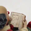 GILDE ClownS „Der kleine Clown” (czyli Mały Klaun z książką) wysokość 9 cm