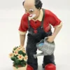 Gilde Clowns – Fridolin 2006, figurka ogrodnika z konewką i kwiatami, 14 cm