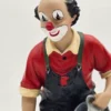 Gilde Clowns – Fridolin 2006, figurka ogrodnika z konewką i kwiatami, 14 cm