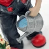 Gilde Clowns – Fridolin 2006, figurka ogrodnika z konewką i kwiatami, 14 cm