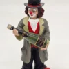 Gilde Clowns “Magnus” z butelką szampana – 17 cm (1. Ausgabe 2002)