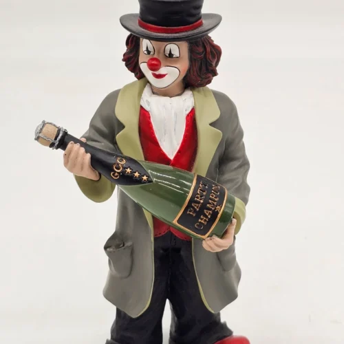 Gilde Clowns “Magnus” z butelką szampana – 17 cm (1. Ausgabe 2002)