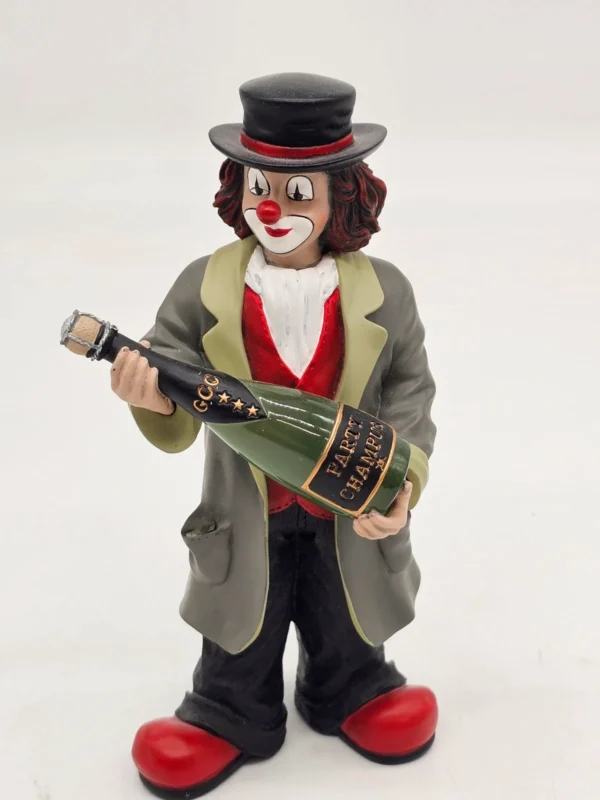 Gilde Clowns “Magnus” z butelką szampana – 17 cm (1. Ausgabe 2002)