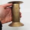 Zestaw dwóch metalowych świeczników kolumnowych, 26 cm i 14 cm