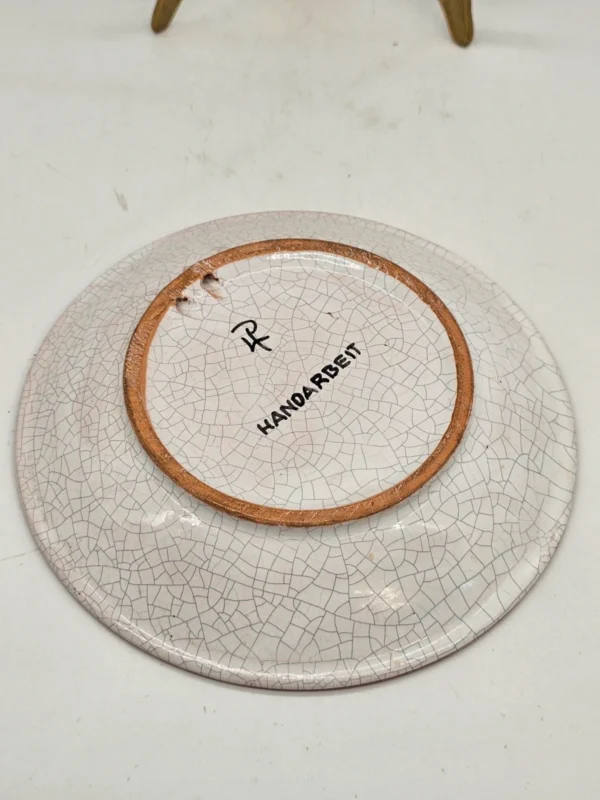 Ręcznie malowany talerz ceramiczny Handarbeit w kwiaty