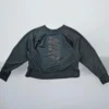 Damska bluza Nike cropped z wycięciem na plecach – sportowy styl