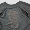 Damska bluza Nike cropped z wycięciem na plecach – sportowy styl