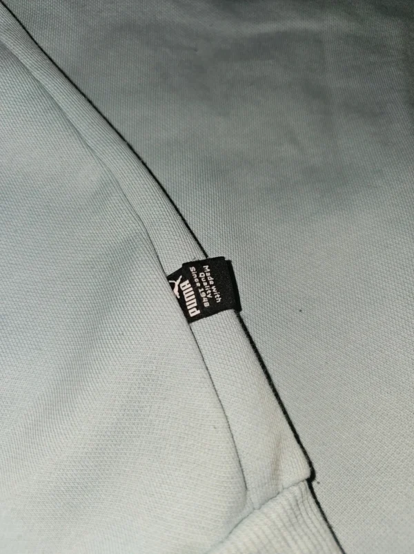 Bluza Puma XL – błękitna, logo z przodu, 100% bawełna, 64×54 cm
