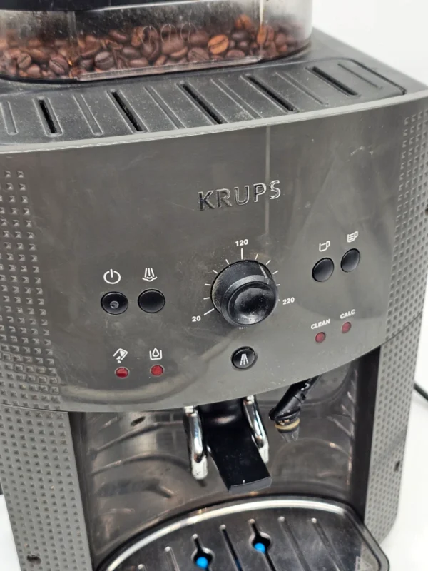 Ekspres automatyczny Krups EA81 młynek ziarnisty mocno zakamieniony wyciek wody