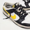 Nike Dunk Low Czarno białe zółty swoosh EUR 42 oryginalne