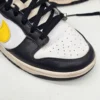 Nike Dunk Low Czarno białe zółty swoosh EUR 42 oryginalne