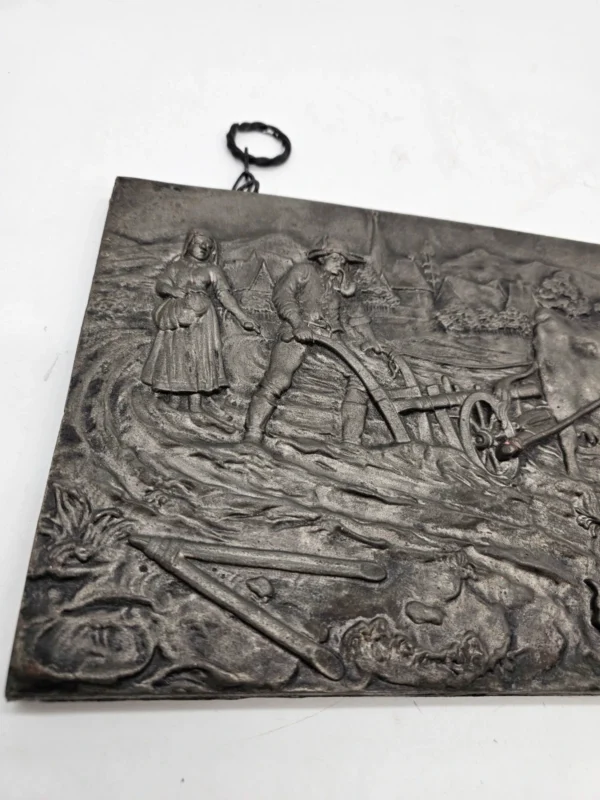 Metalowa płaskorzeźba scena wiejska z wołami 39x22 cm