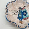 Dekoracyjny talerz ścienny C.A.F.F. Gubbio Italy „Contrada del ricchio” ręcznie malowany Ø 19 cm