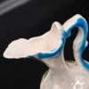 Dzbanek ceramiczny Z kwiatowym reliefem pastelowy błękit i róż, lata 60–70.