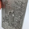 Metalowa plakieta ścienna relief ogrodnik z kaktusem vintage 22x29