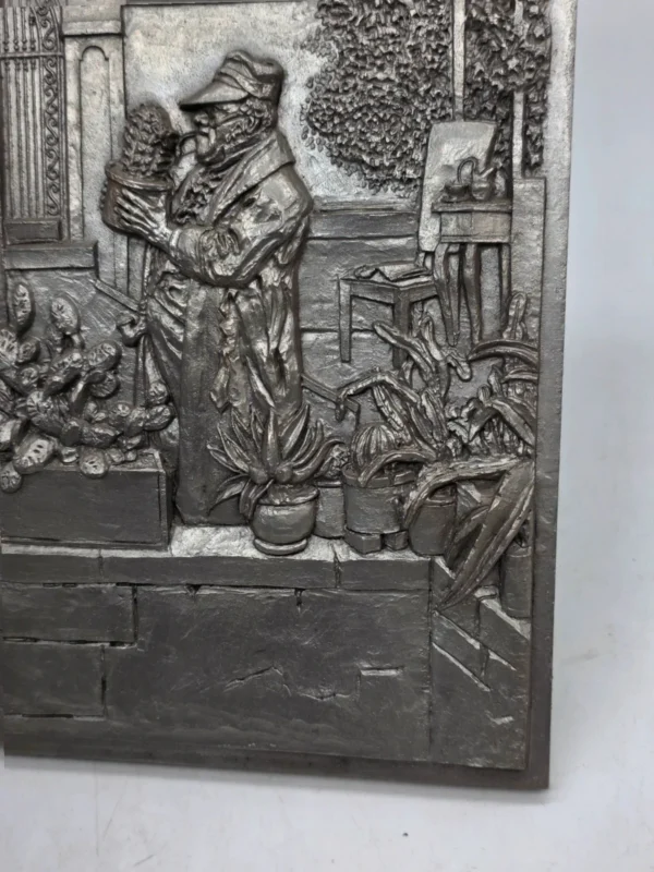 Metalowa plakieta ścienna relief ogrodnik z kaktusem vintage 22x29