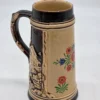 Smukły kufel ceramiczny relief motyw kwiatowy i alpejski 19 cm