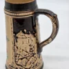 Smukły kufel ceramiczny relief motyw kwiatowy i alpejski 19 cm