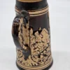 Smukły kufel ceramiczny relief motyw kwiatowy i alpejski 19 cm