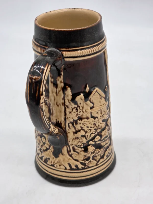 Smukły kufel ceramiczny relief motyw kwiatowy i alpejski 19 cm