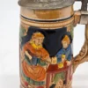 Kolekcjonerski kufel ceramiczny z klapką biesiada relief 19 cm