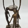 Mosiężna figurka świecznik z trzema postaciami vintage 24 cm