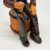 Figurka ceramiczna starszy pan siedzący na beczce wysokość 22 cm